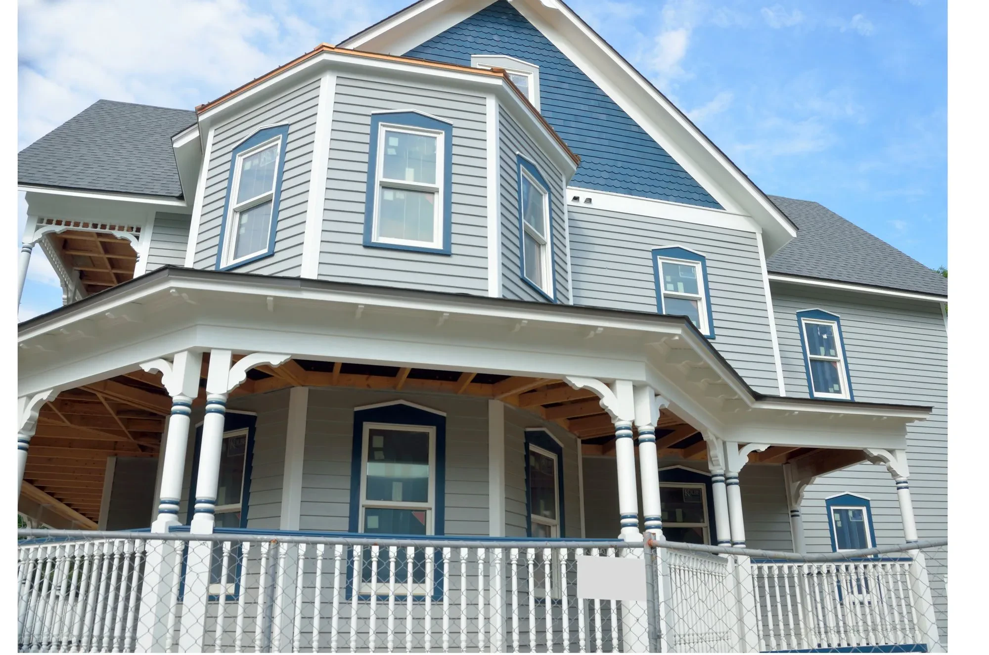 Painted clapboard siding and trim on a Texas home